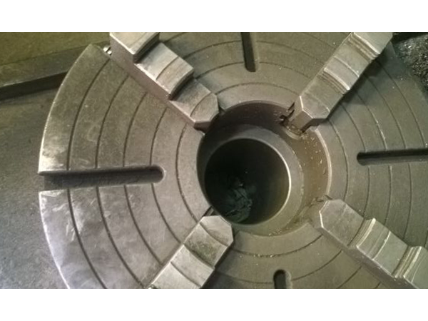 四爪卡盘如何找正，（四爪卡盘找正的简便方法）